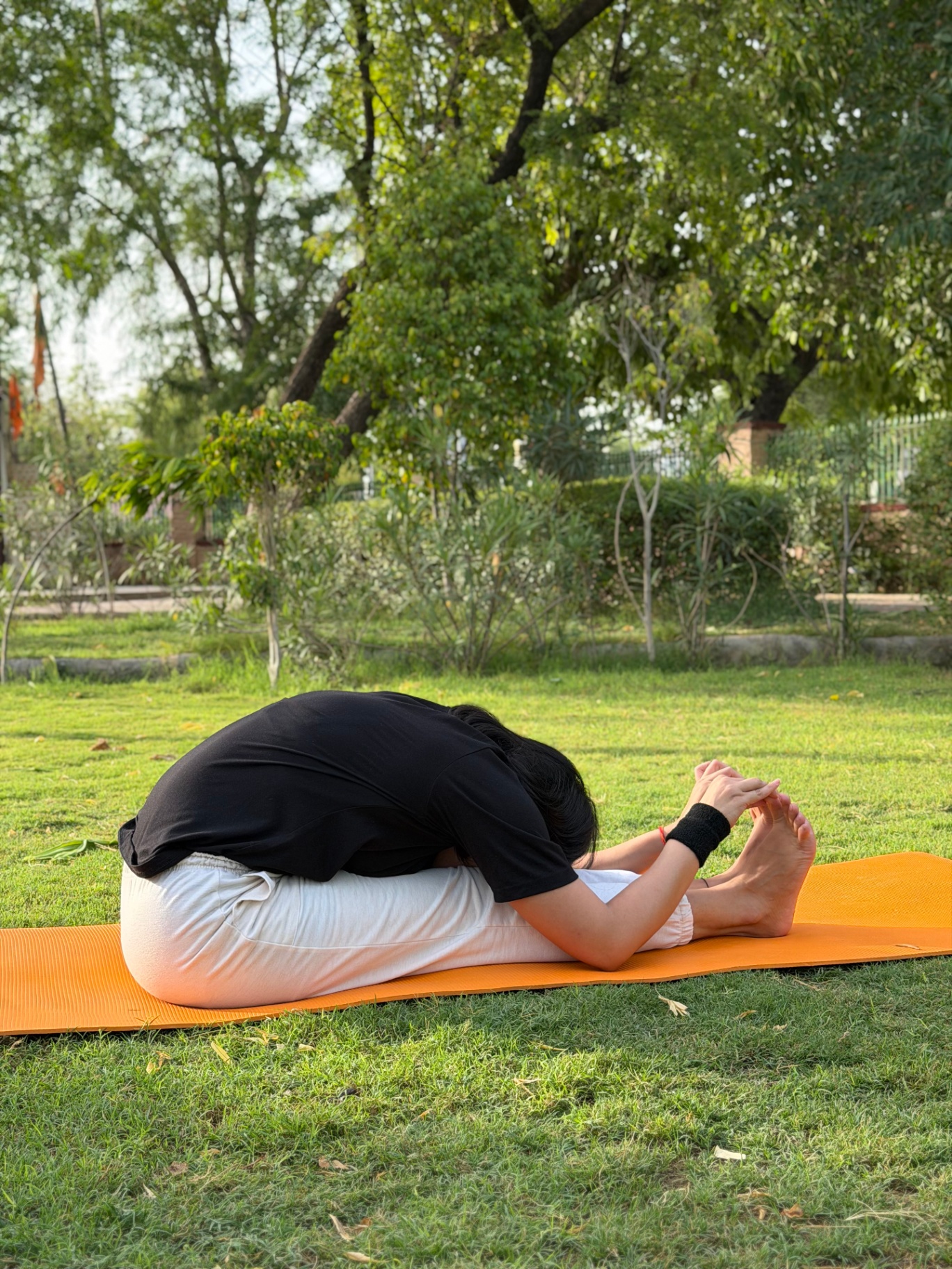 Priya demonstrating Paschimottanasana
